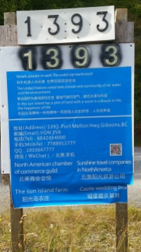 One of five signs in front of the mansion property